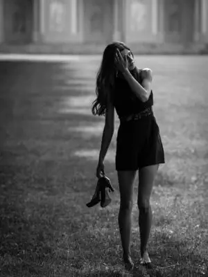 Timeless black and white fine art portrait of a woman, expressing elegance, calm strength, and classic emotional depth
