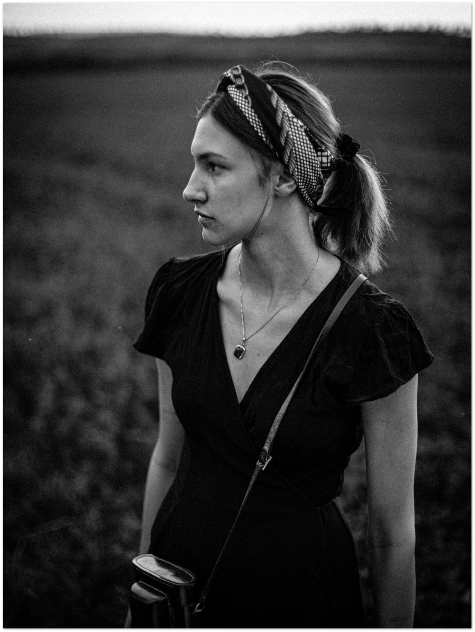 Toni on photo walk in the fields, carrying an old retro cam